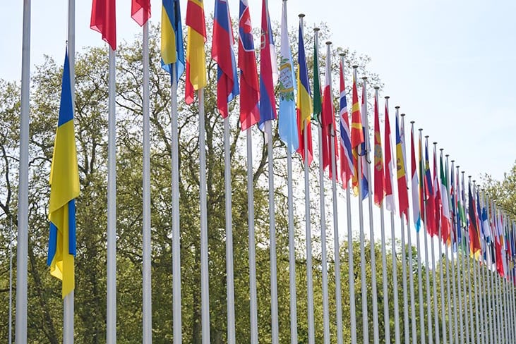 Ukrainian flag flies at half-mast at the entrance to the Council of Europe. / Photo: Council of Europe